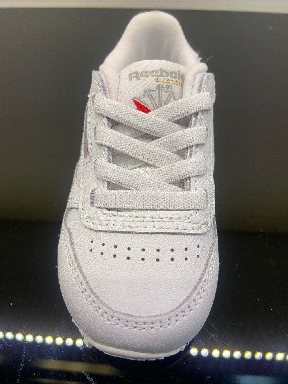 Reebok Kids White Sneaker with Red Accent